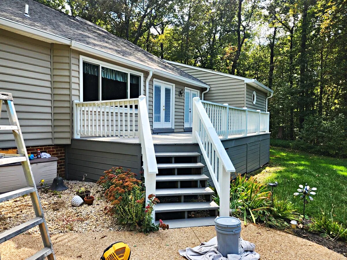 Maintained backyard deck and home exterior cared for by 27 Contracting in Central Virginia