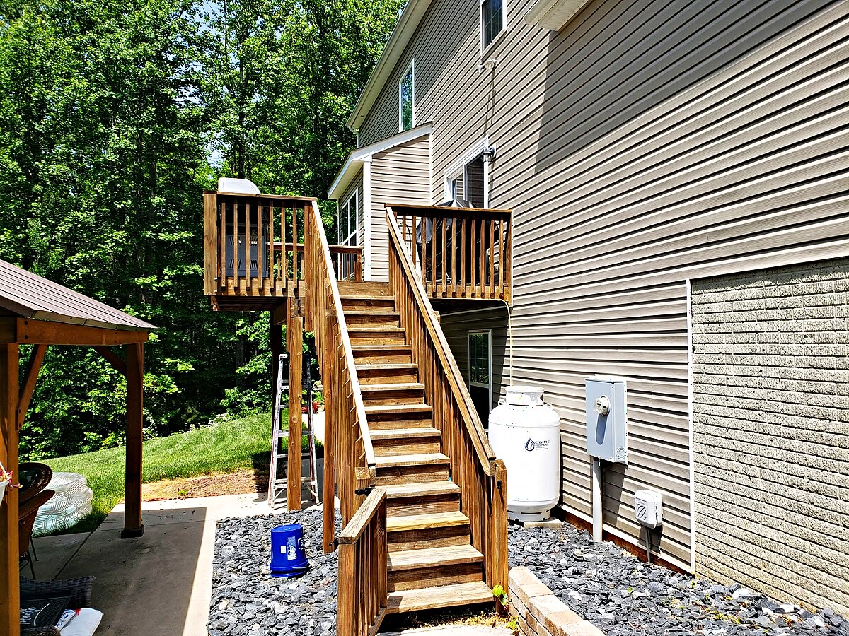 House Painting before — Exterior Stairs Repainted Fresh White