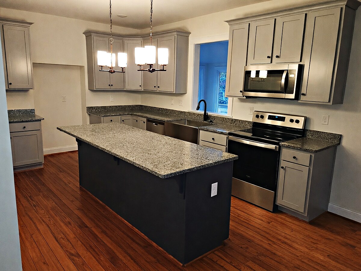 Renovated kitchen with updated cabinetry and finishes by 27 Contracting in Central Virginia